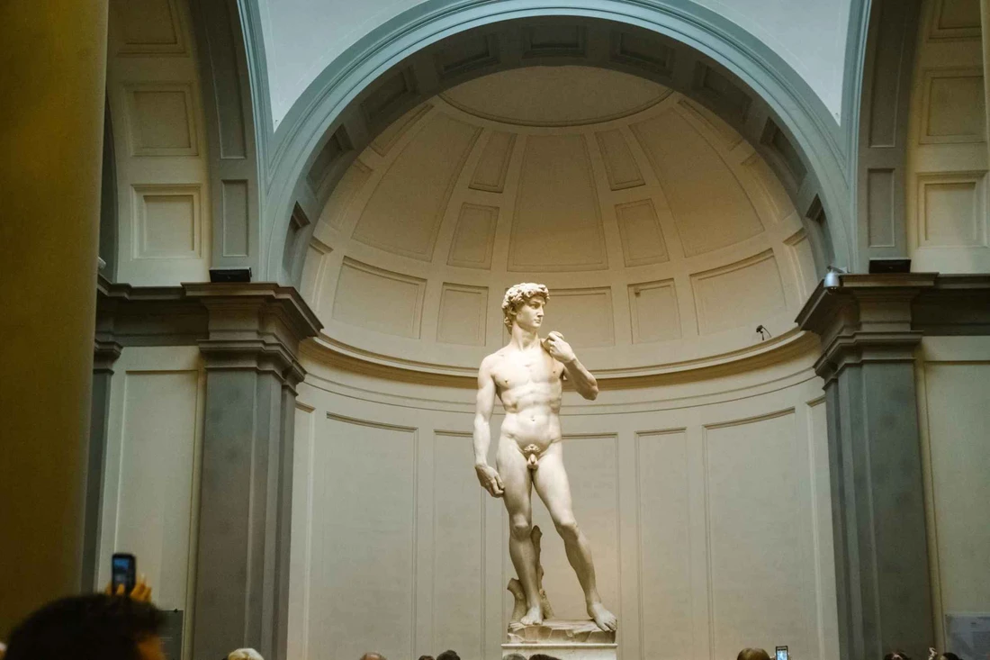 Michelangelo's statue of David under the dome of the Accademia, the museum in Florence, Italy with the statue of David