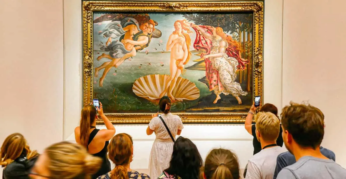 Small group with a guide in front of Renaissance art at the Uffizi, a leading museum in Florence, Italy
